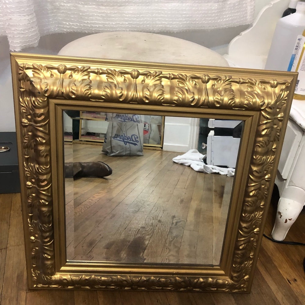 Square gold mirror